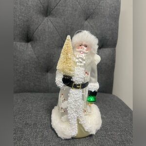 Festive Glass Santa Figurine with Gold and Green Accents